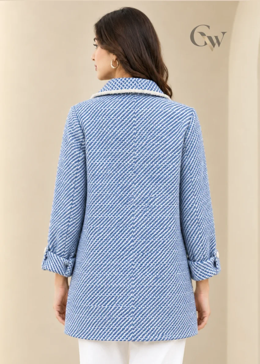 Women's blue and white patterned open-front jacket with lapel-style collar and contrasting light trim