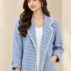 Women's blue and white patterned open-front jacket with lapel-style collar and contrasting light trim