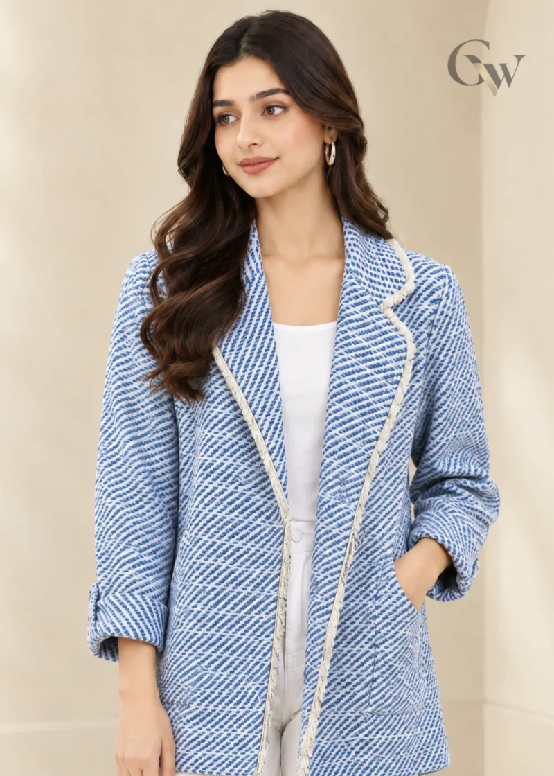Women's blue and white patterned open-front jacket with lapel-style collar and contrasting light trim