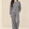 Women's grey co-ord set with pearl-like embellished long-sleeve top and wide-leg trousers