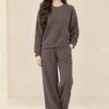 Women's co-ord set with pearl-like embellished long-sleeve top and wide-leg trousers