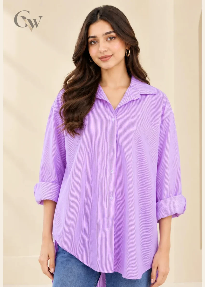 Woman wearing a lavender and white striped button-down shirt with a pointed collar and long sleeves.